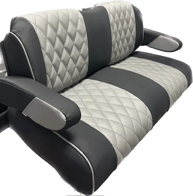 Charcoal and silver diamond-stitched seats with piped armrests