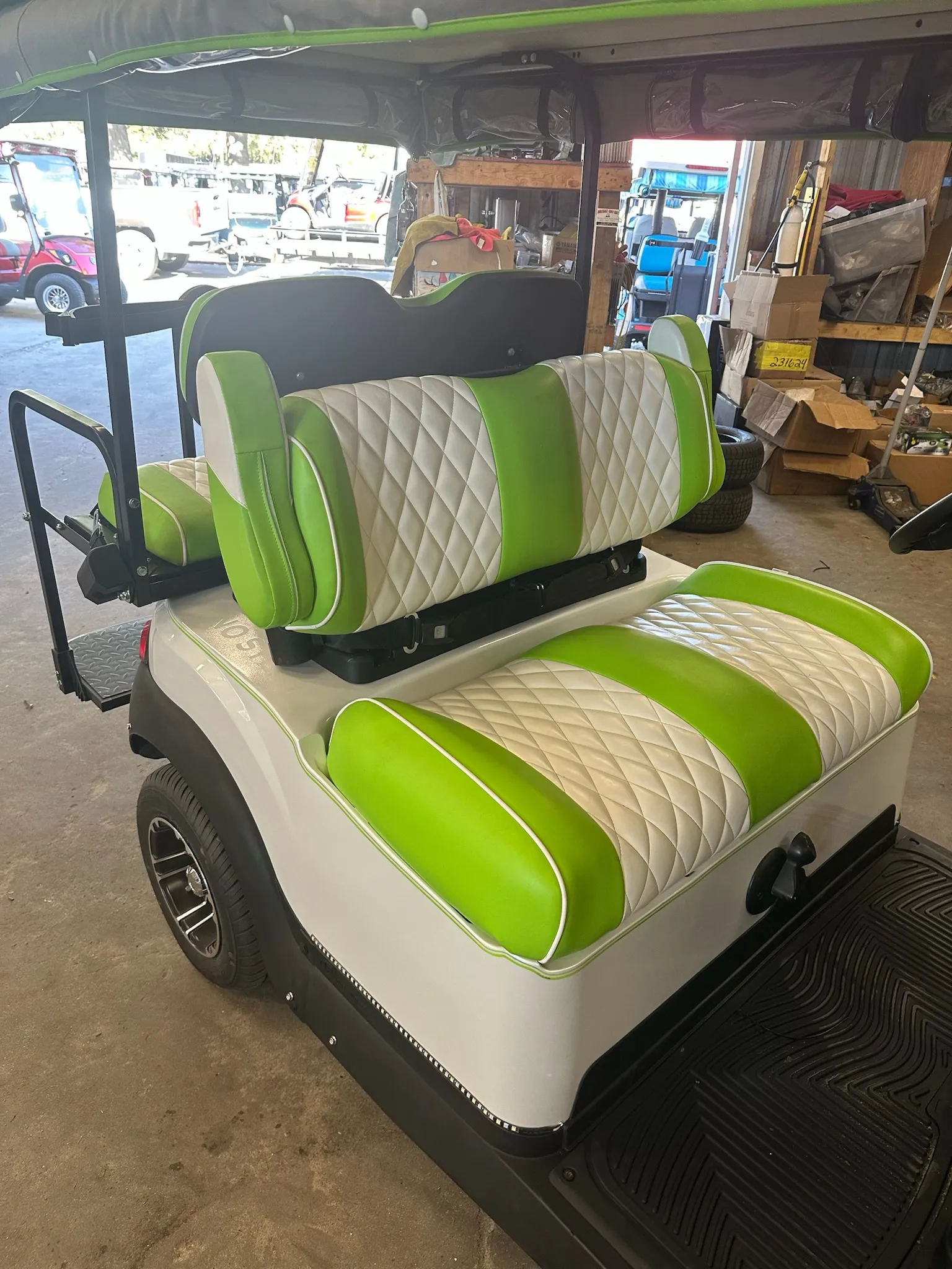 Lime green and white diamond-quilted golf cart seats