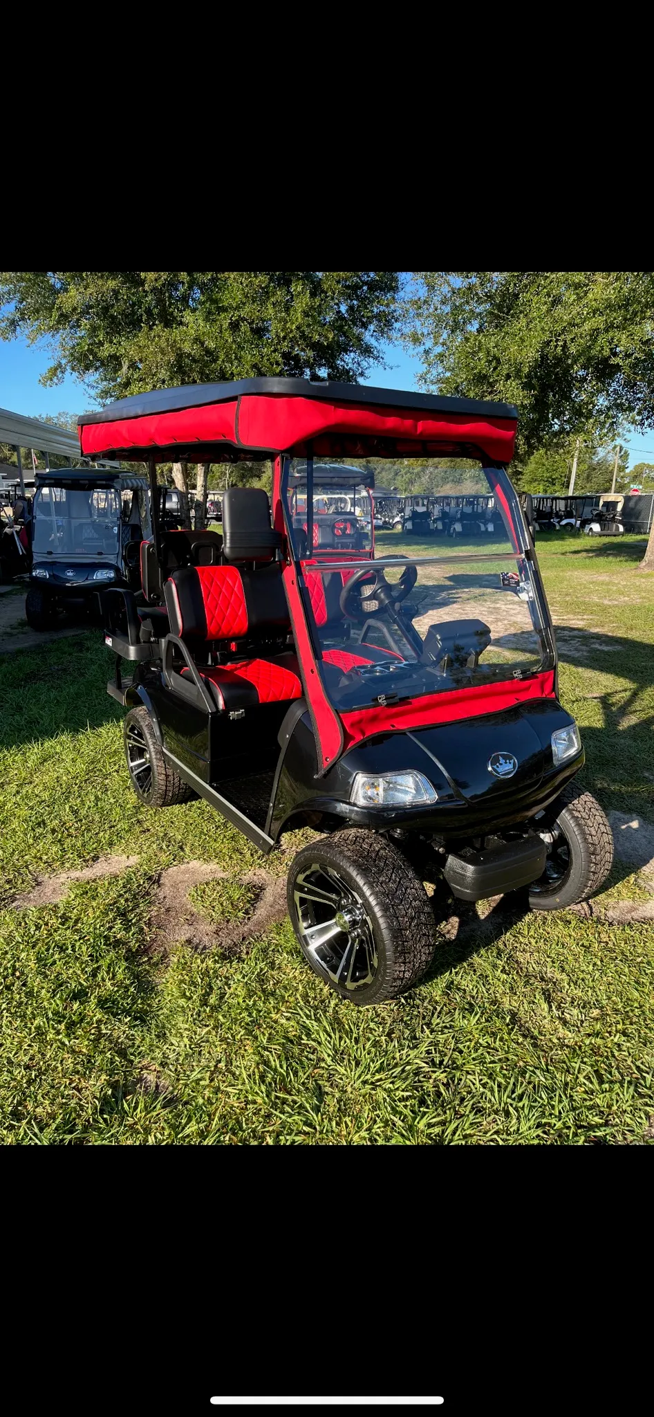 Red canopy valance and matching diamond seats on black cart