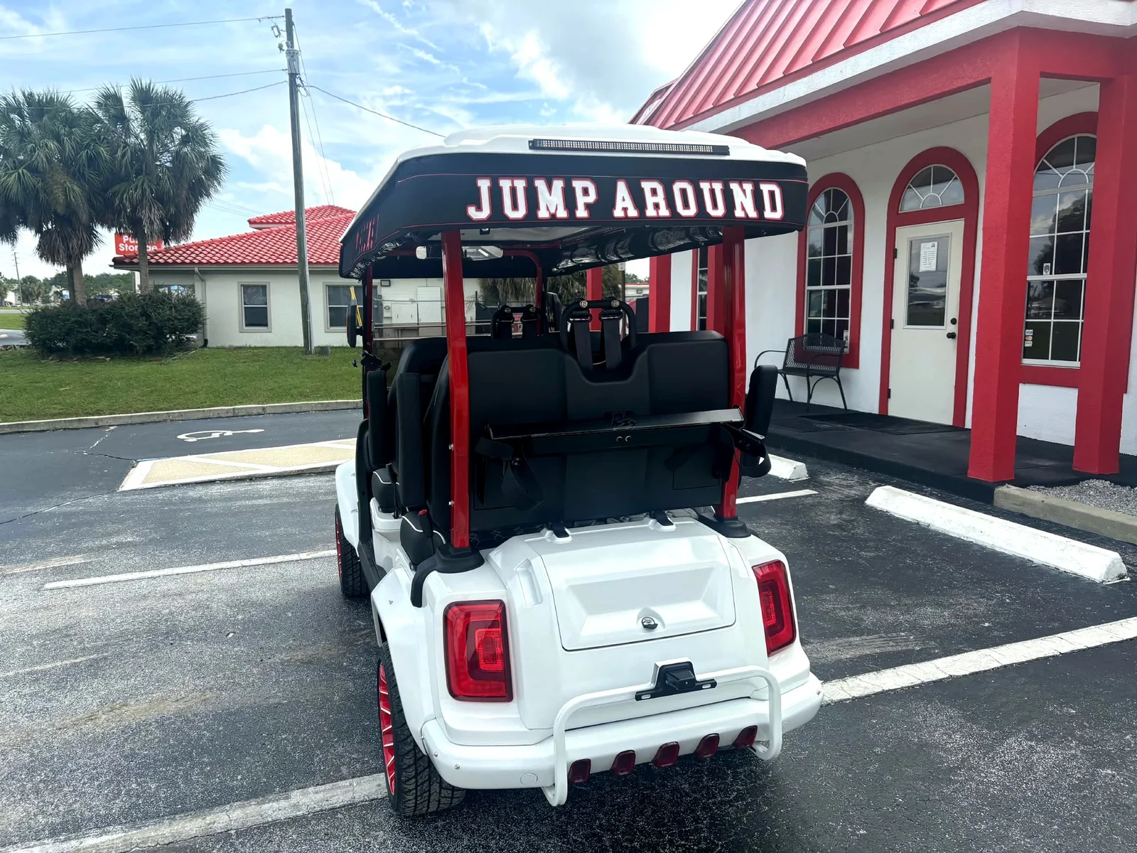 Fully custom Wisconsin Badgers canvas top with lettered valances on a white lifted cart