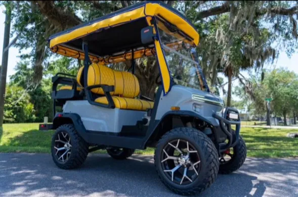Lifted gray cart with yellow diamond-quilted seats