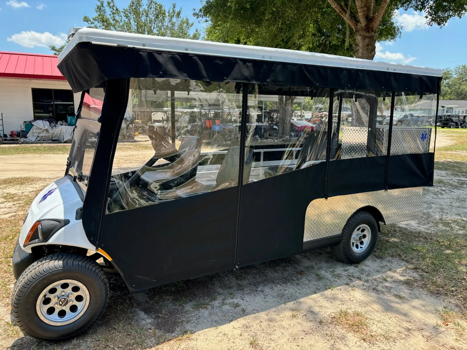Medical shuttle cart with full black enclosure panels